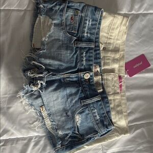 2 pairs of short shorts: NWT Edikted white shorts size XS & EUC Hollister size 0